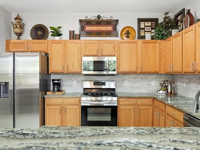 Situated within the gates of Heron Creek Golf & Country Club on Heron Creek Golf and Country Club in Florida - for sale on GolfHomes.com, golf home, golf lot