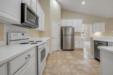 This beautifully landscaped 4-bedroom, 3-bath is an all-brick on The Golf Club At Summerbrooke in Florida - for sale on GolfHomes.com, golf home, golf lot