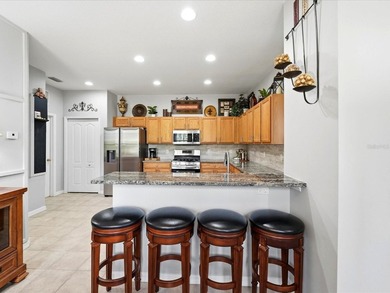 Situated within the gates of Heron Creek Golf & Country Club on Heron Creek Golf and Country Club in Florida - for sale on GolfHomes.com, golf home, golf lot