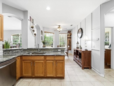 Situated within the gates of Heron Creek Golf & Country Club on Heron Creek Golf and Country Club in Florida - for sale on GolfHomes.com, golf home, golf lot