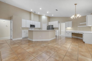 This beautifully landscaped 4-bedroom, 3-bath is an all-brick on The Golf Club At Summerbrooke in Florida - for sale on GolfHomes.com, golf home, golf lot