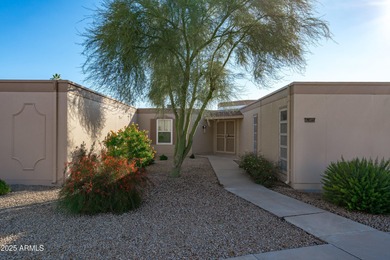 Step inside a residence that blends comfort with a polished on Sun City Lakes West and East in Arizona - for sale on GolfHomes.com, golf home, golf lot