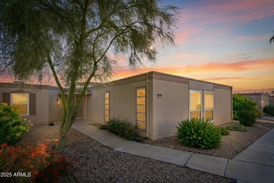 Step inside a residence that blends comfort with a polished on Sun City Lakes West and East in Arizona - for sale on GolfHomes.com, golf home, golf lot