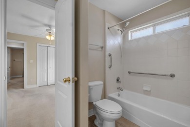 This beautifully landscaped 4-bedroom, 3-bath is an all-brick on The Golf Club At Summerbrooke in Florida - for sale on GolfHomes.com, golf home, golf lot