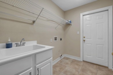 This beautifully landscaped 4-bedroom, 3-bath is an all-brick on The Golf Club At Summerbrooke in Florida - for sale on GolfHomes.com, golf home, golf lot