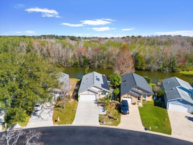 House with a lake in the backyard in a prime location right in on Mayfair Country Club in Florida - for sale on GolfHomes.com, golf home, golf lot