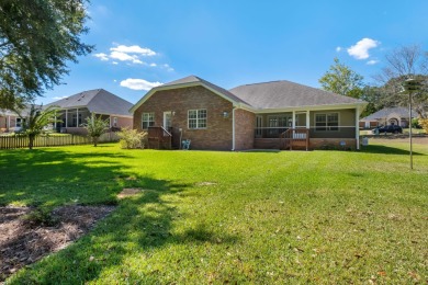 This beautifully landscaped 4-bedroom, 3-bath is an all-brick on The Golf Club At Summerbrooke in Florida - for sale on GolfHomes.com, golf home, golf lot