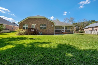 This beautifully landscaped 4-bedroom, 3-bath is an all-brick on The Golf Club At Summerbrooke in Florida - for sale on GolfHomes.com, golf home, golf lot