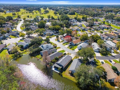 House with a lake in the backyard in a prime location right in on Mayfair Country Club in Florida - for sale on GolfHomes.com, golf home, golf lot