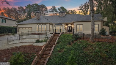 Tucked in Atlanta Country Club's quiet interior, this refreshed on Atlanta Country Club in Georgia - for sale on GolfHomes.com, golf home, golf lot