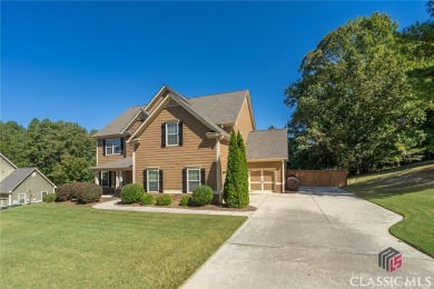 Welcome home to this beautifully maintained 4 bedroom 2 1/2 bath on Cedar Lake Golf Club in Georgia - for sale on GolfHomes.com, golf home, golf lot