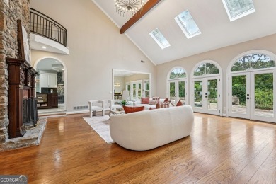 Tucked in Atlanta Country Club's quiet interior, this refreshed on Atlanta Country Club in Georgia - for sale on GolfHomes.com, golf home, golf lot