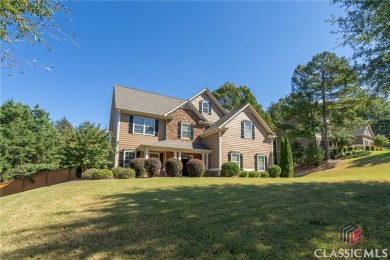 Welcome home to this beautifully maintained 4 bedroom 2 1/2 bath on Cedar Lake Golf Club in Georgia - for sale on GolfHomes.com, golf home, golf lot