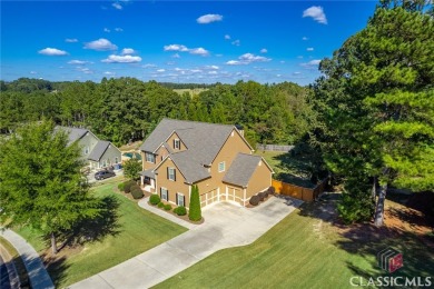 Welcome home to this beautifully maintained 4 bedroom 2 1/2 bath on Cedar Lake Golf Club in Georgia - for sale on GolfHomes.com, golf home, golf lot