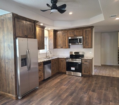 Experience the pinnacle of luxury living in this impeccably on Riverhill Country Club in Texas - for sale on GolfHomes.com, golf home, golf lot