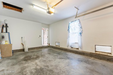Enjoy the ease of one-level living in this low-maintenance on Masonboro Country Club in North Carolina - for sale on GolfHomes.com, golf home, golf lot