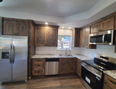 Experience the pinnacle of luxury living in this impeccably on Riverhill Country Club in Texas - for sale on GolfHomes.com, golf home, golf lot