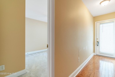 Enjoy the ease of one-level living in this low-maintenance on Masonboro Country Club in North Carolina - for sale on GolfHomes.com, golf home, golf lot