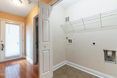 $2,500 credit at closing offered!! Enjoy the ease of one-level on Masonboro Country Club in North Carolina - for sale on GolfHomes.com, golf home, golf lot