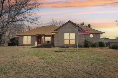 BETTER THAN NEW...This beautiful custom built fully updated home on Pecan Plantation Country Club in Texas - for sale on GolfHomes.com, golf home, golf lot