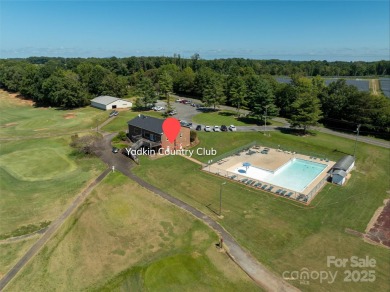 THIS HOME IS OFFERING SPECIAL FINANCING. A 2:1 INTEREST RATE on Yadkin Country Club in North Carolina - for sale on GolfHomes.com, golf home, golf lot