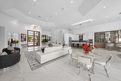 TURNKEY sophisticated luxury offering a true move-in-ready on Bocaire Country Club in Florida - for sale on GolfHomes.com, golf home, golf lot