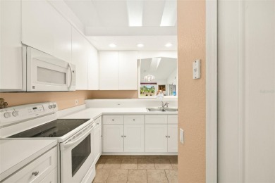 Welcome to your slice of paradise in this stunning two-bedroom on Kingsway Country Club in Florida - for sale on GolfHomes.com, golf home, golf lot