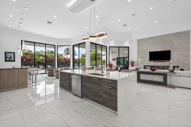 TURNKEY sophisticated luxury offering a true move-in-ready on Bocaire Country Club in Florida - for sale on GolfHomes.com, golf home, golf lot