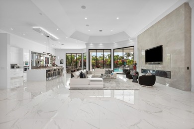 TURNKEY sophisticated luxury offering a true move-in-ready on Bocaire Country Club in Florida - for sale on GolfHomes.com, golf home, golf lot