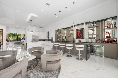 TURNKEY sophisticated luxury offering a true move-in-ready on Bocaire Country Club in Florida - for sale on GolfHomes.com, golf home, golf lot