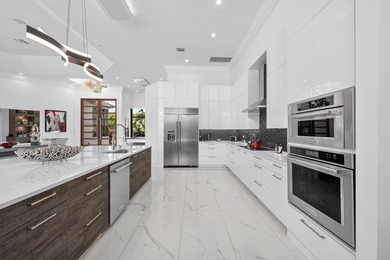 TURNKEY sophisticated luxury offering a true move-in-ready on Bocaire Country Club in Florida - for sale on GolfHomes.com, golf home, golf lot