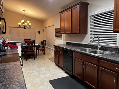 If you are seeking a spacious open concept, 3 Bedroom, 2 on Meadow Oaks Golf and Country Club in Florida - for sale on GolfHomes.com, golf home, golf lot