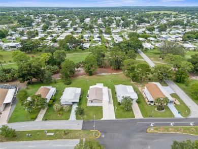 Welcome to this STUNNING and spacious open floor plan home on Brookridge Country Club in Florida - for sale on GolfHomes.com, golf home, golf lot