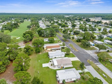 Welcome to this STUNNING and spacious open floor plan home on Brookridge Country Club in Florida - for sale on GolfHomes.com, golf home, golf lot