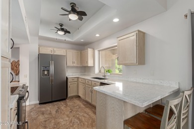 Discover this inviting ranch-style home perfectly placed on a on Trail Ridge Golf Course in Arizona - for sale on GolfHomes.com, golf home, golf lot