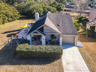 Nestled in the Indigo Lakes community on a private cul-de-sac on Indigo Lakes Golf Club in Florida - for sale on GolfHomes.com, golf home, golf lot