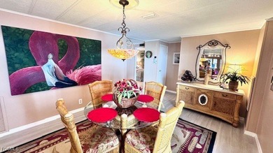 Welcome to your dream retreat in the premier 55+ waterfront on Riverbend Golf and Country Club in Florida - for sale on GolfHomes.com, golf home, golf lot