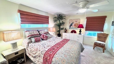 Welcome to your dream retreat in the premier 55+ waterfront on Riverbend Golf and Country Club in Florida - for sale on GolfHomes.com, golf home, golf lot