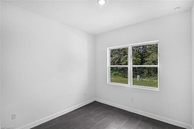 One or more photo(s) has been virtually staged, AI generated or on Rotonda Golf and Country Club The Palms Course in Florida - for sale on GolfHomes.com, golf home, golf lot