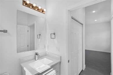 One or more photo(s) has been virtually staged, AI generated or on Rotonda Golf and Country Club The Palms Course in Florida - for sale on GolfHomes.com, golf home, golf lot