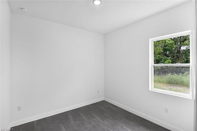 One or more photo(s) has been virtually staged, AI generated or on Rotonda Golf and Country Club The Palms Course in Florida - for sale on GolfHomes.com, golf home, golf lot