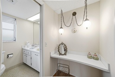 Discover sweeping golf course views from this desirable on Palm-Aire Country Club and Resort - The Oaks in Florida - for sale on GolfHomes.com, golf home, golf lot