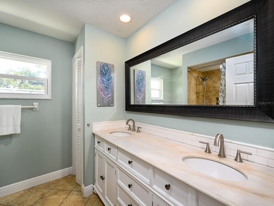 This exceptional lakefront gem is a nearly 2,000-square-foot on Gulf Gate Golf Club in Florida - for sale on GolfHomes.com, golf home, golf lot