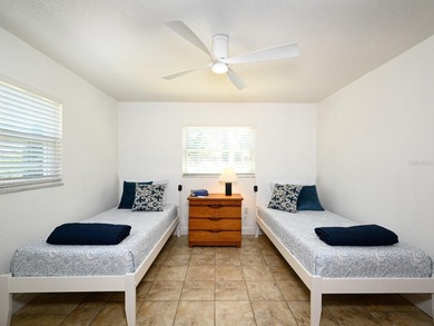 This exceptional lakefront gem is a nearly 2,000-square-foot on Gulf Gate Golf Club in Florida - for sale on GolfHomes.com, golf home, golf lot