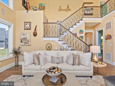 An Elevated Coastal Sanctuary in The Peninsula Welcome to 33530 on The Peninsula Golf and Country Club in Delaware - for sale on GolfHomes.com, golf home, golf lot