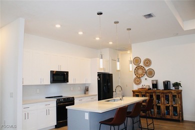 Experience elevated coastal luxury in this impeccably designed on Burnt Store Golf Club in Florida - for sale on GolfHomes.com, golf home, golf lot