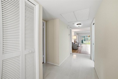 Discover sweeping golf course views from this desirable on Palm-Aire Country Club and Resort - The Oaks in Florida - for sale on GolfHomes.com, golf home, golf lot