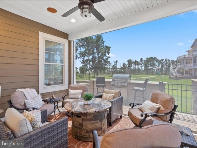 An Elevated Coastal Sanctuary in The Peninsula Welcome to 33530 on The Peninsula Golf and Country Club in Delaware - for sale on GolfHomes.com, golf home, golf lot