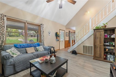 Set on a gently sloping, beautifully landscaped lot in a quiet on Holiday Island Executive Golf Course in Arkansas - for sale on GolfHomes.com, golf home, golf lot