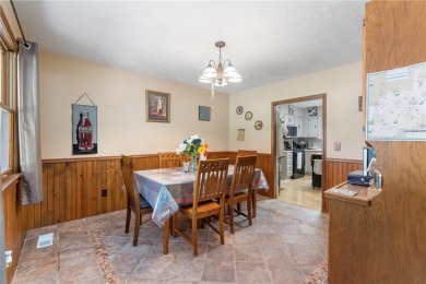 Set on a gently sloping, beautifully landscaped lot in a quiet on Holiday Island Executive Golf Course in Arkansas - for sale on GolfHomes.com, golf home, golf lot